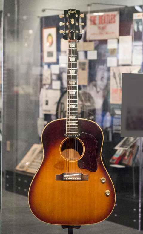 Image: John Lennon’s 1962 Gibson J-160E source Wiki