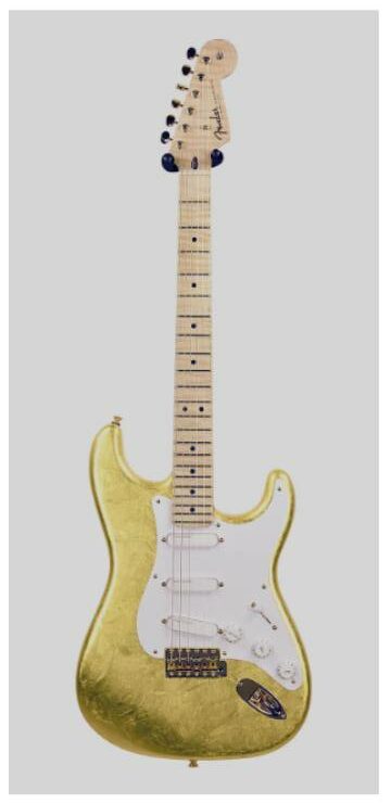 A Gold leaf Stratocaster, Eric Clapton Image Source: Reverb